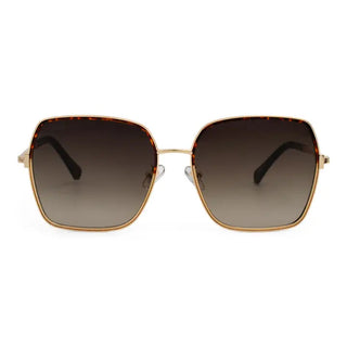 Women's oversized square frame sunglasses with gold metal frame, tortoiseshell accents, and gradient brown lenses.