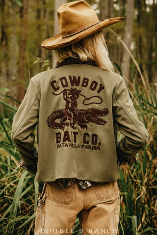 Olive green cropped jacket with brown embroidered "Cowboy Bait Co. Catahoula Parish" graphic featuring cowboy riding alligato