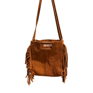 Camel brown Italian suede crossbody bag with fringed sides, long adjustable strap, and open top design.