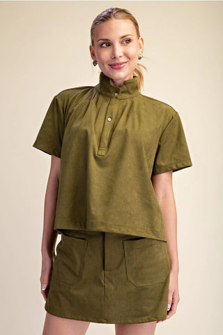 Olive green suede-look stand collar short sleeve pullover shirt with gold button placket detail.