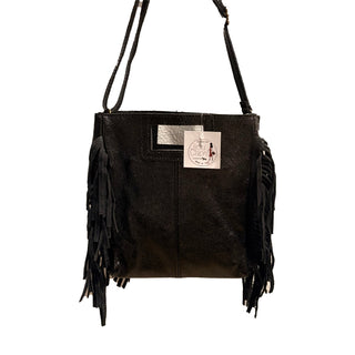 Black metallic Italian leather crossbody bag with long fringe trim on sides and adjustable strap.