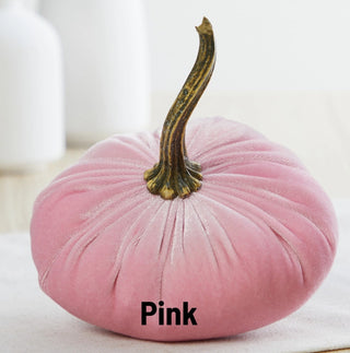 Small pink velvet fabric pumpkin with a natural dried stem, fall decorative accent piece.