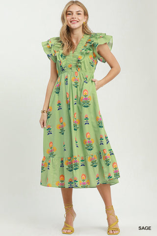 Sage green floral block print midi dress with ruffle trim neckline and flutter sleeves.