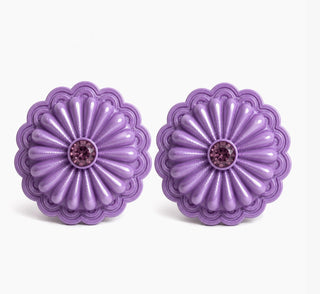 Pair of round purple concho statement earrings with scalloped edges and amethyst crystal centers.
