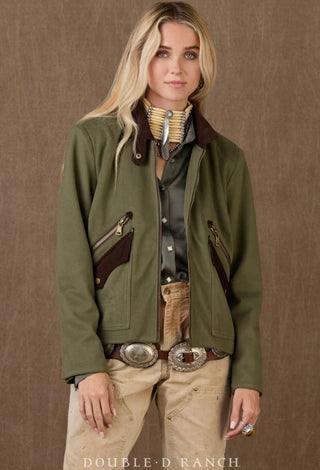 Olive green utility jacket with brown suede trim, zip pockets, and gold hardware, styled western.