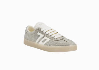 Silver crystal-embellished low-top sneaker with white stripe logo detail and cream rubber sole.