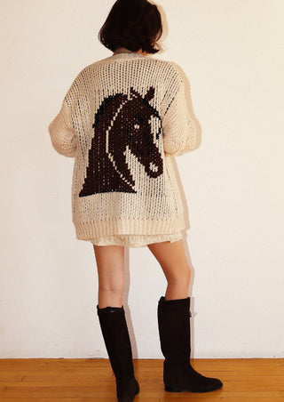 Cream open-knit oversized cardigan with large dark brown horse head graphic on the back.
