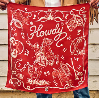Red western bandana with "Howdy" script, cowboy on rearing horse, guitars, lassos, and "FS" branded motifs.
