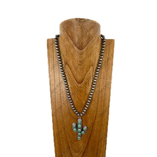 22-inch silver Navajo pearl beaded necklace featuring a green turquoise stone cactus pendant on wooden display bust.