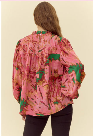 Abstract print top with feminine frilled neck