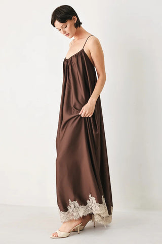 Chocolate brown satin midi slip dress with cream lace hem trim and thin spaghetti straps.