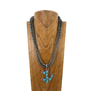 24-inch double-strand silver Navajo pearl beaded necklace with turquoise and coral cactus pendant on wooden display bust.
