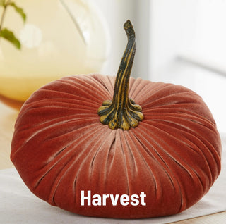 Extra large rust-orange velvet pumpkin with realistic dark green textured stem, fall harvest decoration.