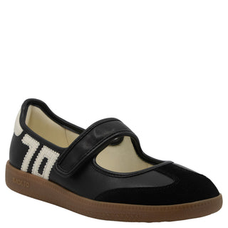 Black leather Mary Jane flat with velcro strap, cream "70" logo detail, and gum rubber sole.