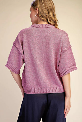 Dusty pink lurex metallic knit sweater with short sleeves, ribbed cuffs, and collared neckline, back view.