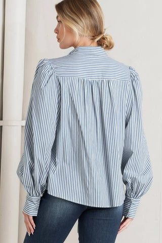Blue and white striped woven button-up top with billowy long sleeves and gathered back detail.