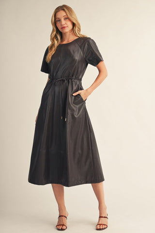 Black faux leather midi dress with short sleeves, drawstring waist tie, and A-line skirt with pockets.