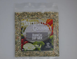 Clear packet of Tastefully Gourmet Ranch Dip Mix seasoning blend, 12 servings, no MSG or preservatives.