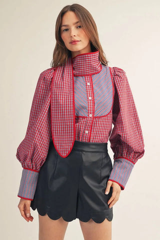 Red and blue plaid puff sleeve button-down shirt with attached tie neck scarf accent detail.