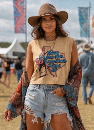 Tan boxy muscle crop top with Texas State Fair 1985 Country Music Festival graphic print in blue and pink.