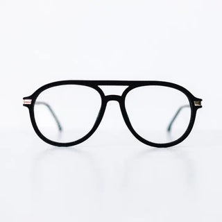 Black velvet aviator-style reading glasses with double bridge, clear lenses, and gold-accented hinges.