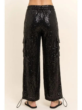Black wide-leg sequin cargo pants with side pockets and adjustable drawstring hem, back view.