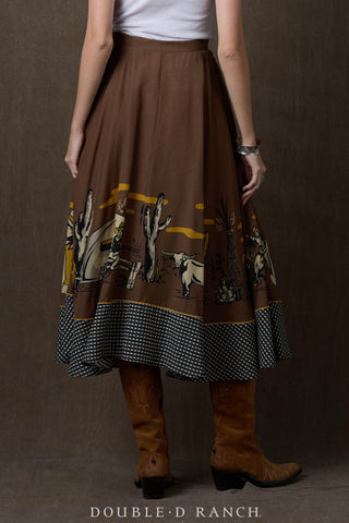 Brown midi circle skirt with western print border featuring longhorns, cacti, and oil derricks, with black gingham hem trim.