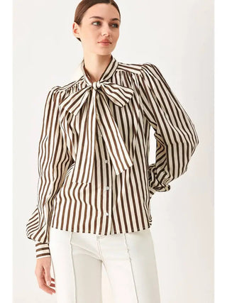 Brown and white striped woven blouse with pussy bow tie neck and puffed long sleeves.