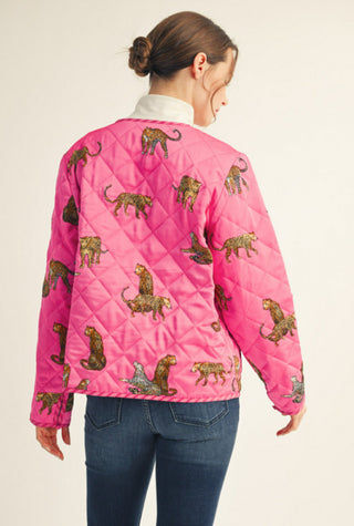 Hot pink quilted long sleeve jacket with allover leopard print pattern, worn from behind.