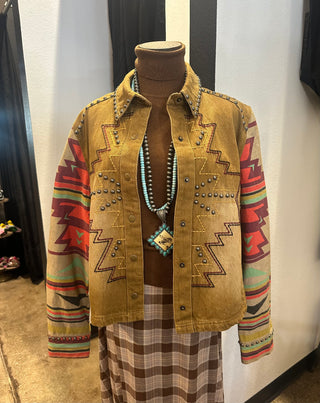 Sidekick Jacket in mustard yellow with Southwestern aztec print, silver studded details, and snap buttons.