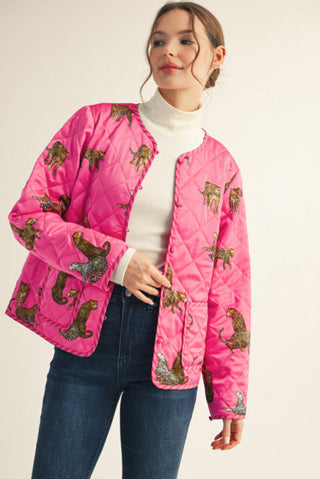 Hot pink quilted button-down jacket featuring allover leopard print, long sleeves, and front pockets.