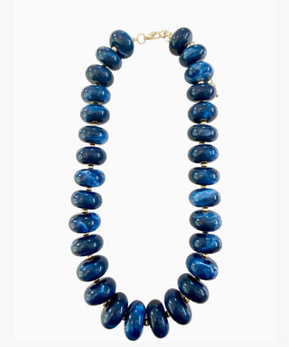 Navy blue chunky rondelle beaded necklace with marbled finish and gold-tone lobster clasp closure.