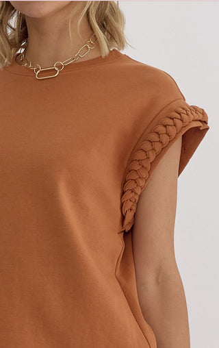 Round neck cap sleeve top featuring braided detail at cuff