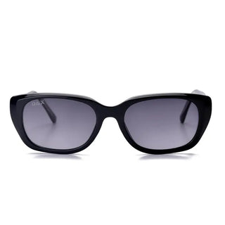 Black small cat eye polarized sunglasses with glossy frame, gradient gray lenses, and DAX branding on left lens.