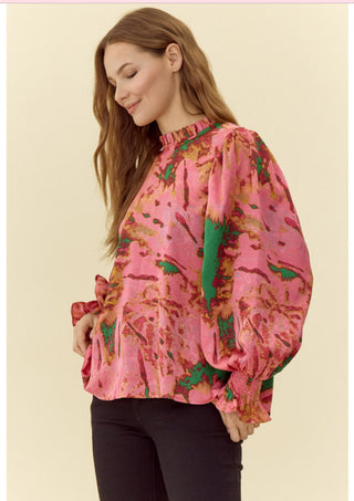 Abstract print top with feminine frilled neck