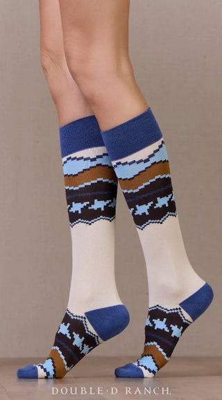 Knee-high Mane Stay Socks in cream, blue, brown, and light blue Southwest-inspired geometric pattern.