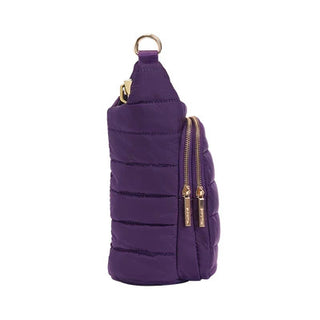 Deep amethyst purple quilted sling bag with gold zipper hardware and D-ring attachment loop.