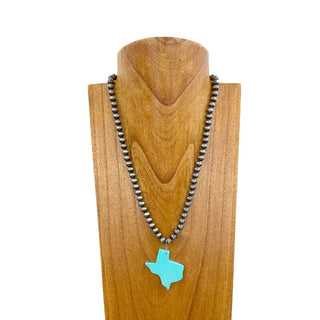 Silver Navajo pearl beaded necklace with turquoise blue Texas state map pendant on wooden display bust.