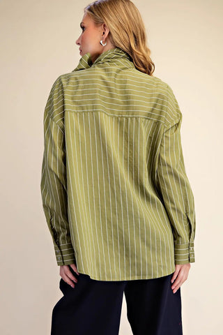 Olive green pinstripe high neck oversized shirt with long sleeves and buttoned cuffs, back view.