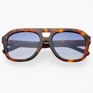 Oversized aviator sunglasses with tortoise acetate frames and gradient blue lenses, folded flat view.