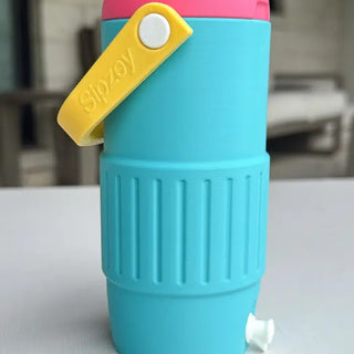 Teal and pink retro jug-style soda can cooler holder with yellow Sipjoy carry handle latch.