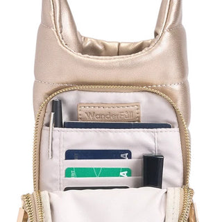 Gold vegan leather mini crossbody bag open showing interior card slots, pen holder, and organized compartments.