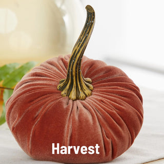 Large harvest-colored dusty rose velvet pumpkin with decorative natural gourd stem, fall mantel decor accent.