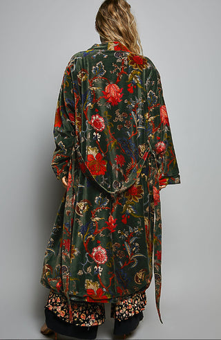 Dark green floral velvet kimono robe with red blooms, tied waist, and floor-length silhouette, shown from back.