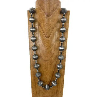 Oxidized sterling silver Navajo pearl necklace featuring large round beads alternating with small roundel spacer beads.