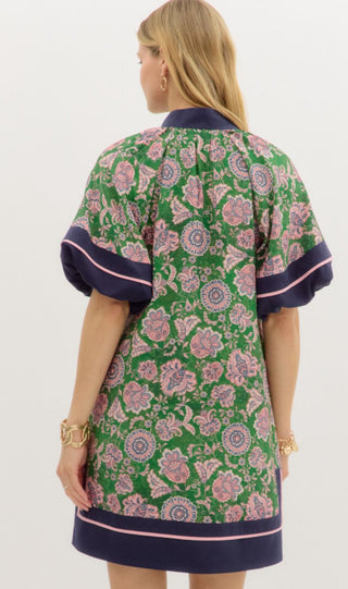Green and pink floral paisley mini dress with navy contrast bubble sleeves and hem border trim