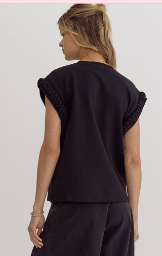 Round neck cap sleeve top featuring braided detail at cuff