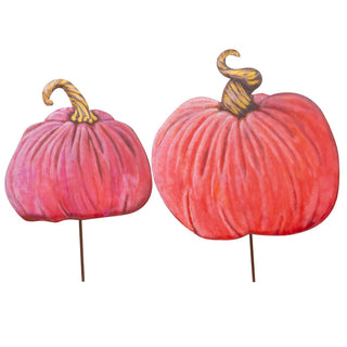Set of two pink and coral painted pumpkin yard stakes with curled stems on metal rods.