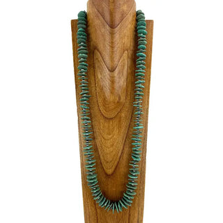 38-inch natural green flat turquoise stone disc bead necklace displayed on wooden jewelry bust.