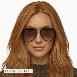 Woman wearing Earhart Cheetah tortoiseshell aviator sunglasses with brown gradient polarized lenses.
